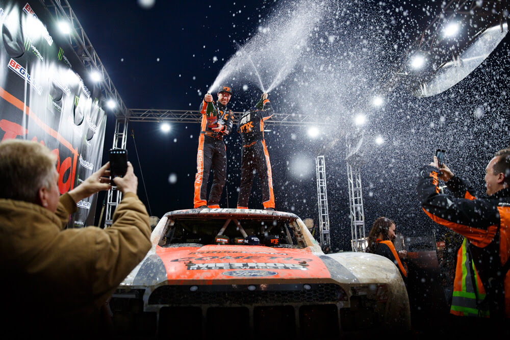 Justin Lofton Champagne spray after winning the 2019 Mint 400