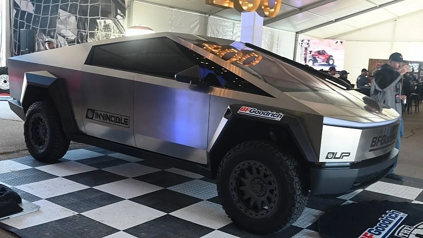 modded tesla cybertruck on bfg tires catches the action in the mint s vip tent